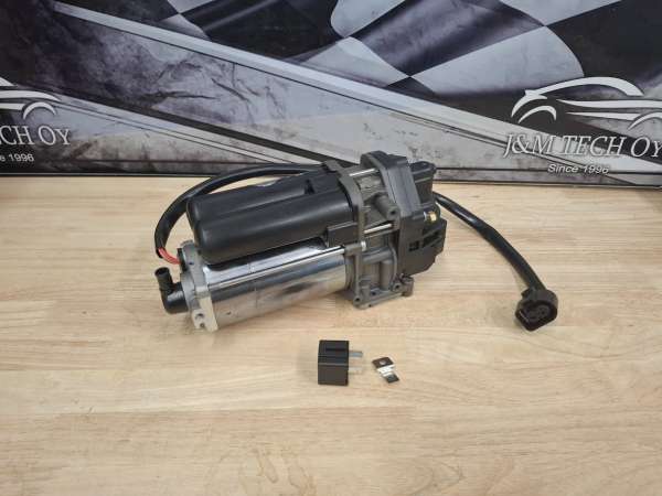 Ilmajousituksen kompressori asennettuna  Wabco 4154064060