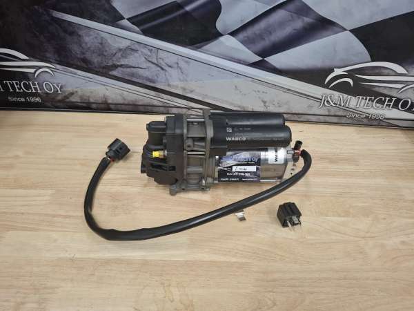 Ilmajousituksen kompressori asennettuna  Wabco 4154064060